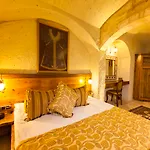 Отель Kayakapi Premium Caves Cappadocia
