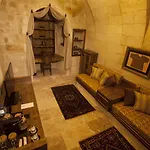 Отель Kayakapi Premium Caves Cappadocia